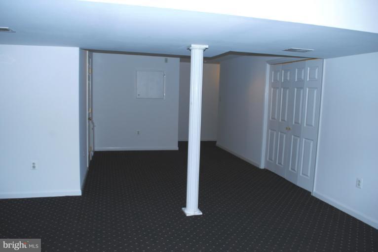 9303 Sandra Park Road Perry Hall, MD 21128 - Photo 20 of 25 an empty room with wooden floor