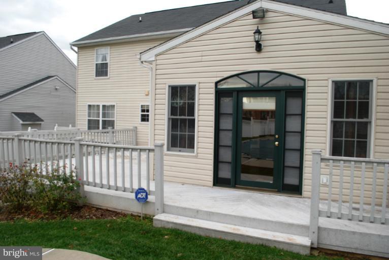9303 Sandra Park Road Perry Hall, MD 21128 - Photo 6 of 25 a view of a house with a yard and a large window