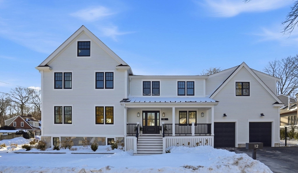 12 Daley Road Hingham, MA 02043 - Photo 1 of 33 a front view of a house with glass windows