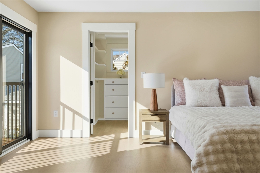 12 Daley Road Hingham, MA 02043 - Photo 22 of 33 a bedroom with a bed and a mirror on the dresser
