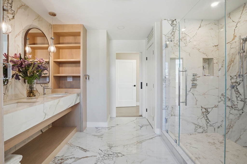 12 Daley Road Hingham, MA 02043 - Photo 25 of 33 a large bathroom with a tub shower and sink