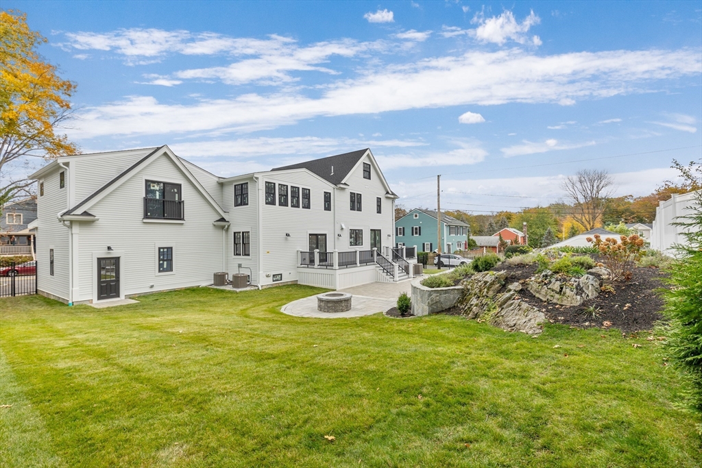 12 Daley Road Hingham, MA 02043 - Photo 32 of 39 a view of a house with a big yard and large trees