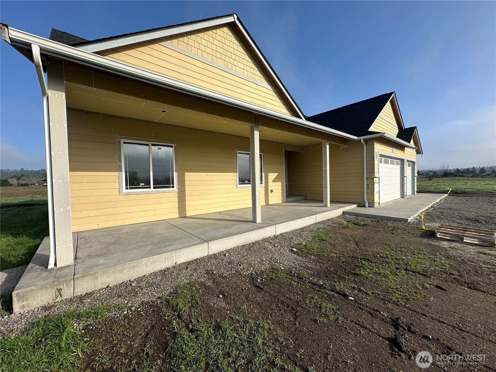 14317 Mima Road Southwest Olympia, WA 98512 - Photo 2 of 39 a view of house with backyard and trees in the background