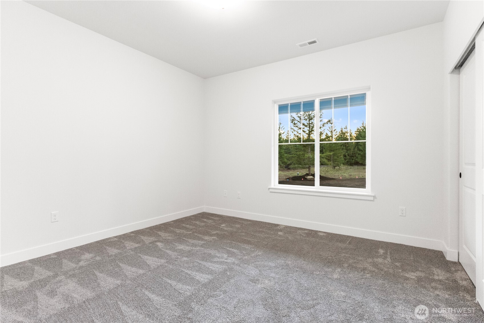 14317 Mima Road Southwest Olympia, WA 98512 - Photo 23 of 39 an empty room with a window
