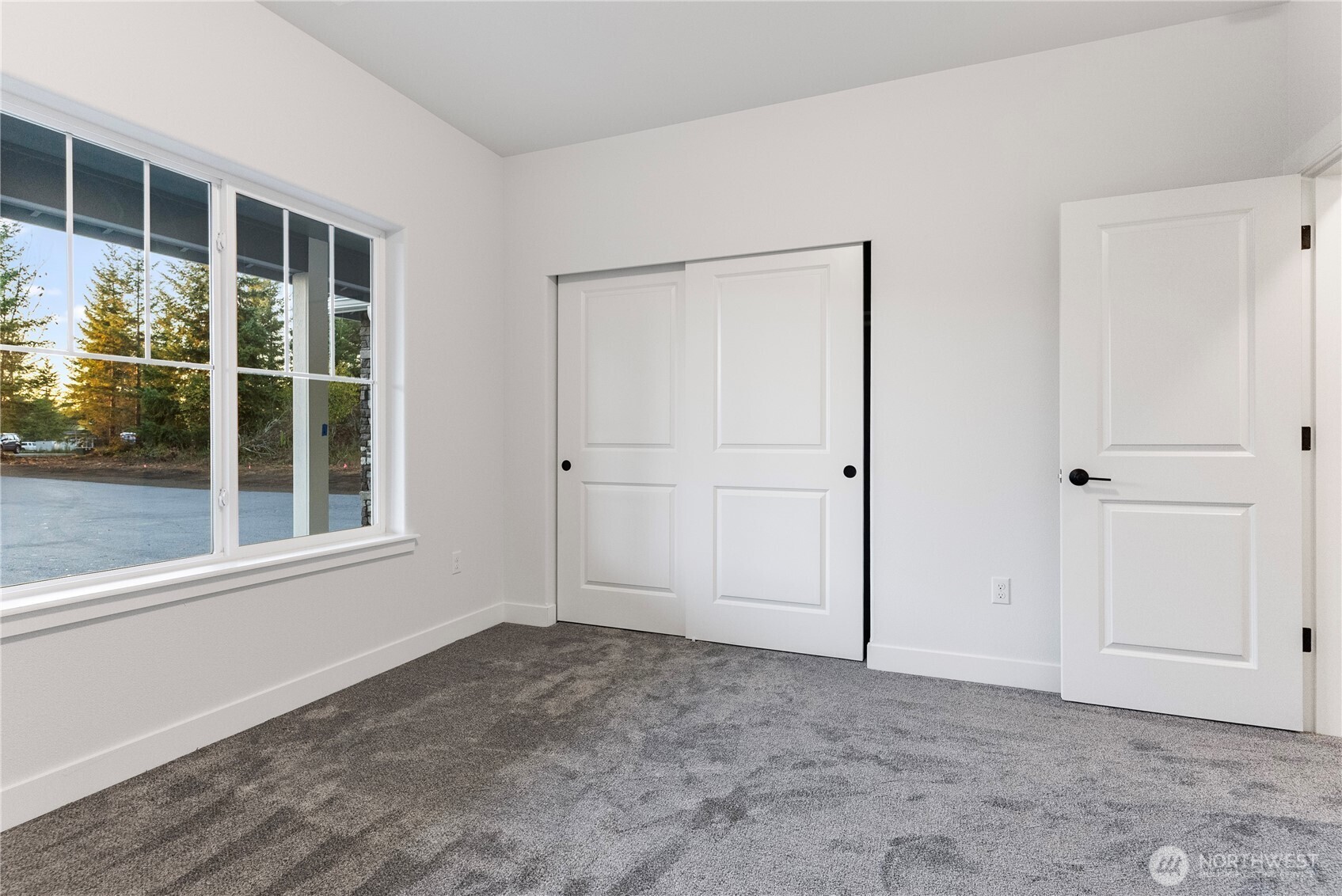 14317 Mima Road Southwest Olympia, WA 98512 - Photo 24 of 39 an empty room with windows
