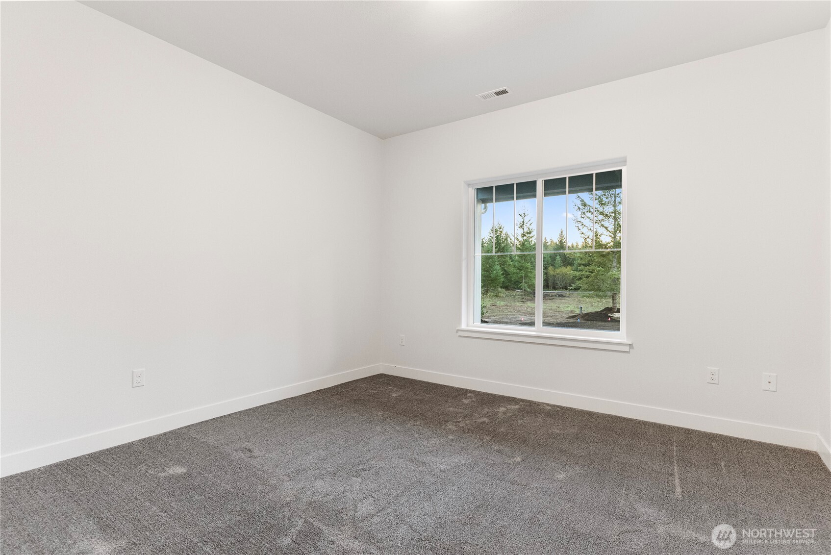14317 Mima Road Southwest Olympia, WA 98512 - Photo 25 of 39 an empty room with a window