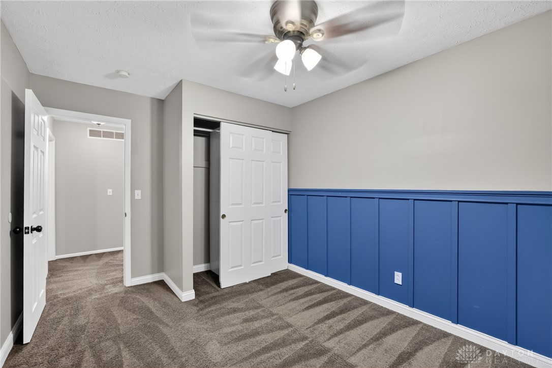 5741 Gray Road Fairfield, OH 45014 - Photo 14 of 32 This cozy bedroom features plush carpet flooring and a closet for ample storage.