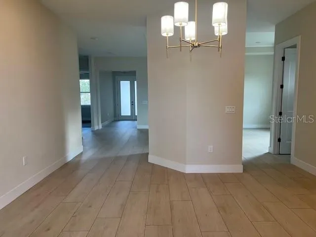 a view of a room that has a window in it