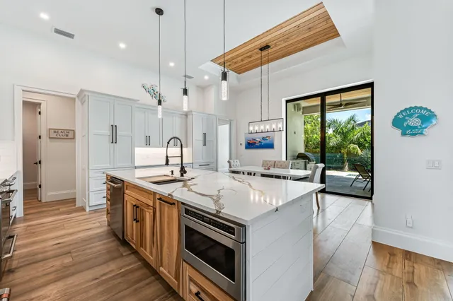 a kitchen with a stove and a refrigerator
