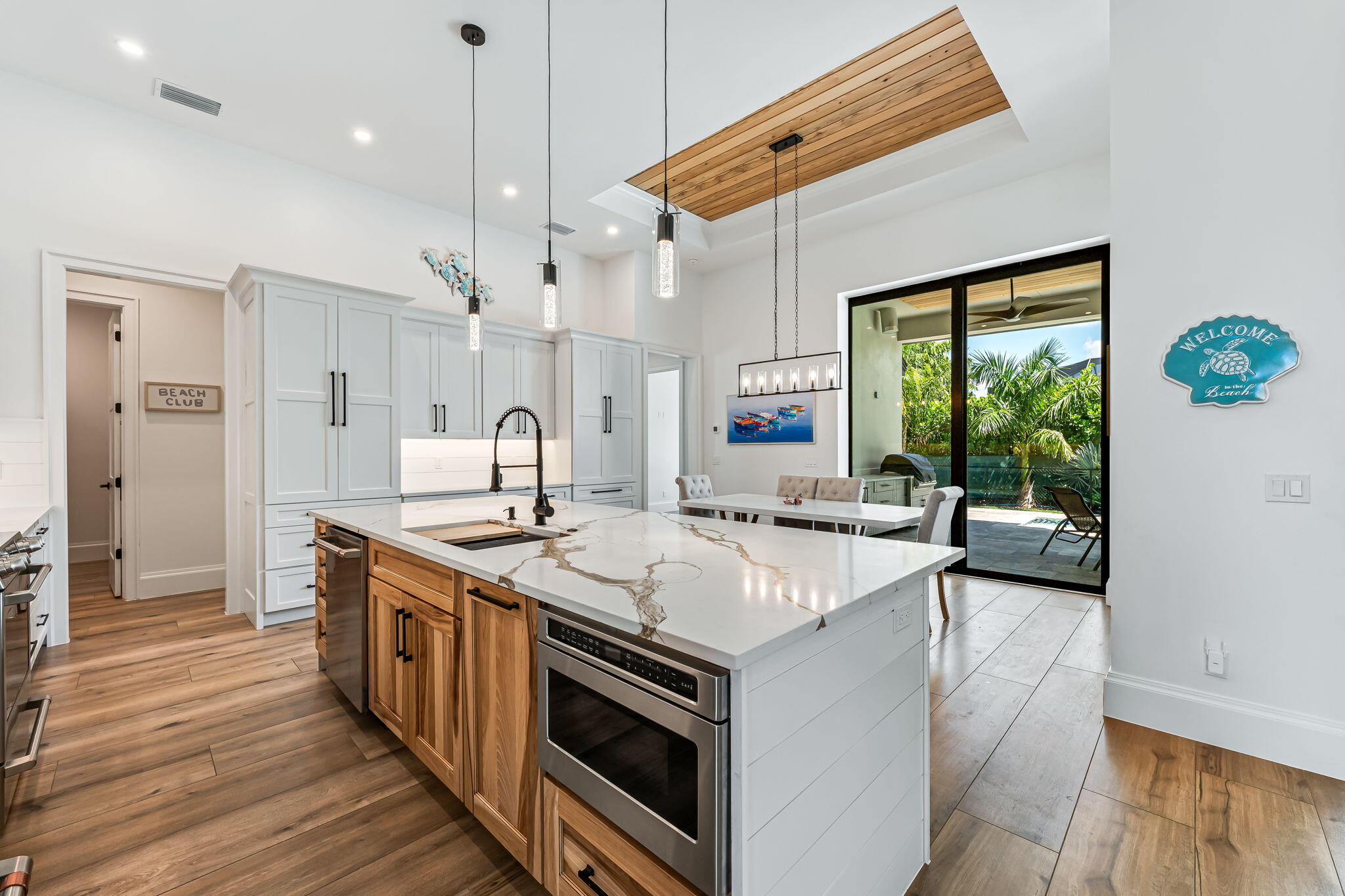1362 San Marco Road Marco Island, FL 34145 - Photo 13 of 45 a kitchen with a stove and a refrigerator