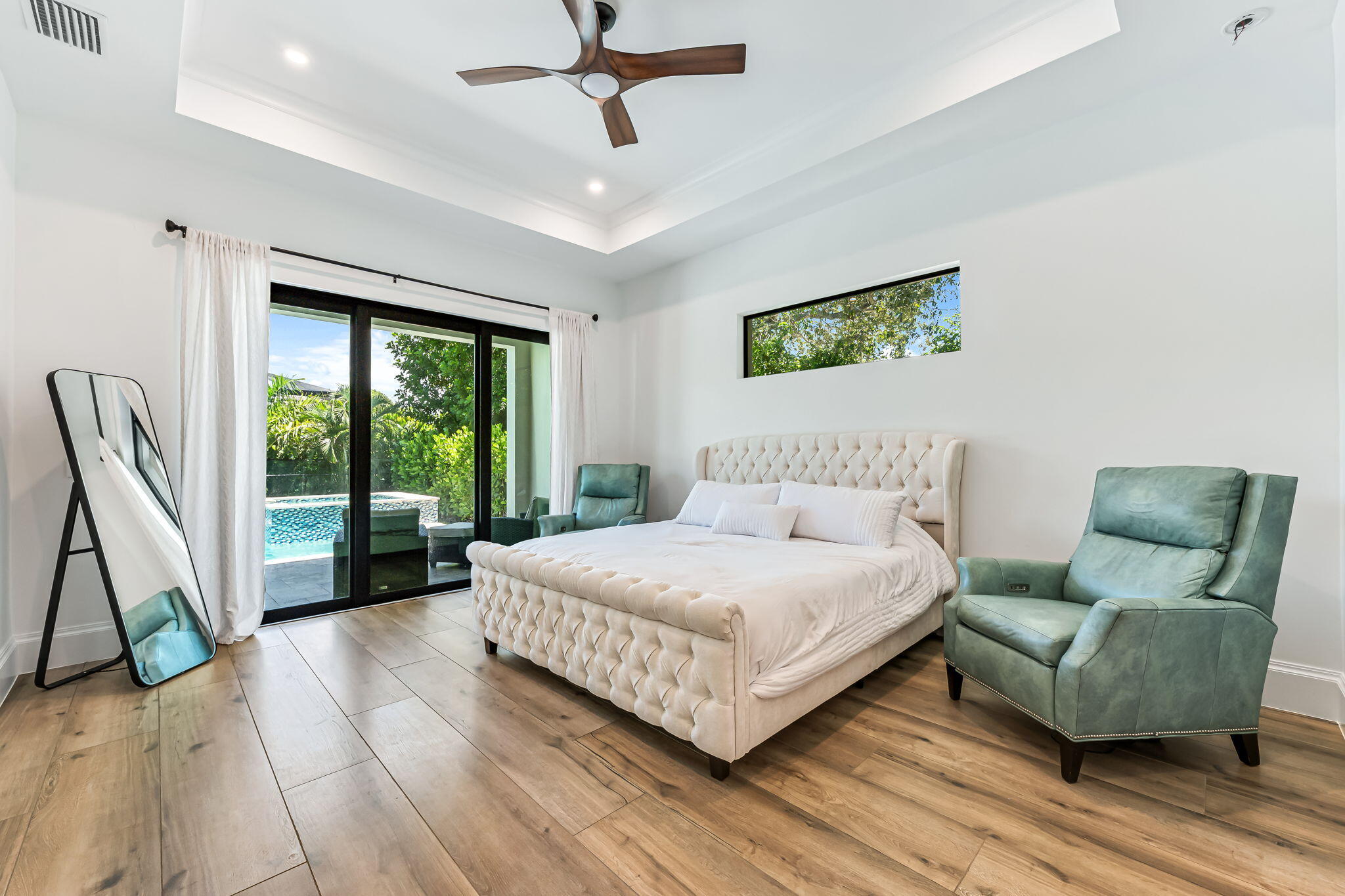 1362 San Marco Road Marco Island, FL 34145 - Photo 19 of 45 a living room with a bed furniture and a large window
