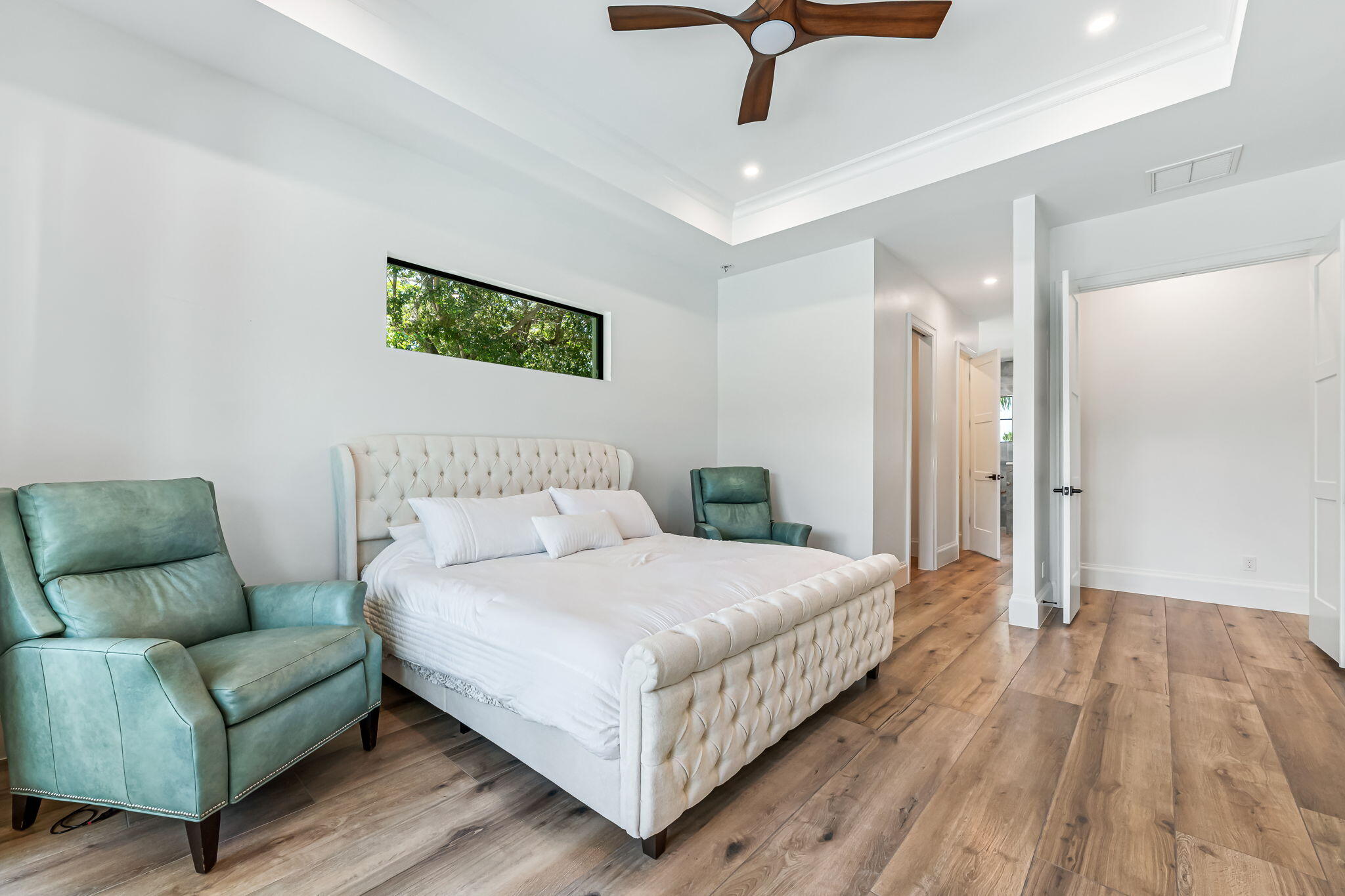 1362 San Marco Road Marco Island, FL 34145 - Photo 20 of 45 a bedroom with a bed and a couch