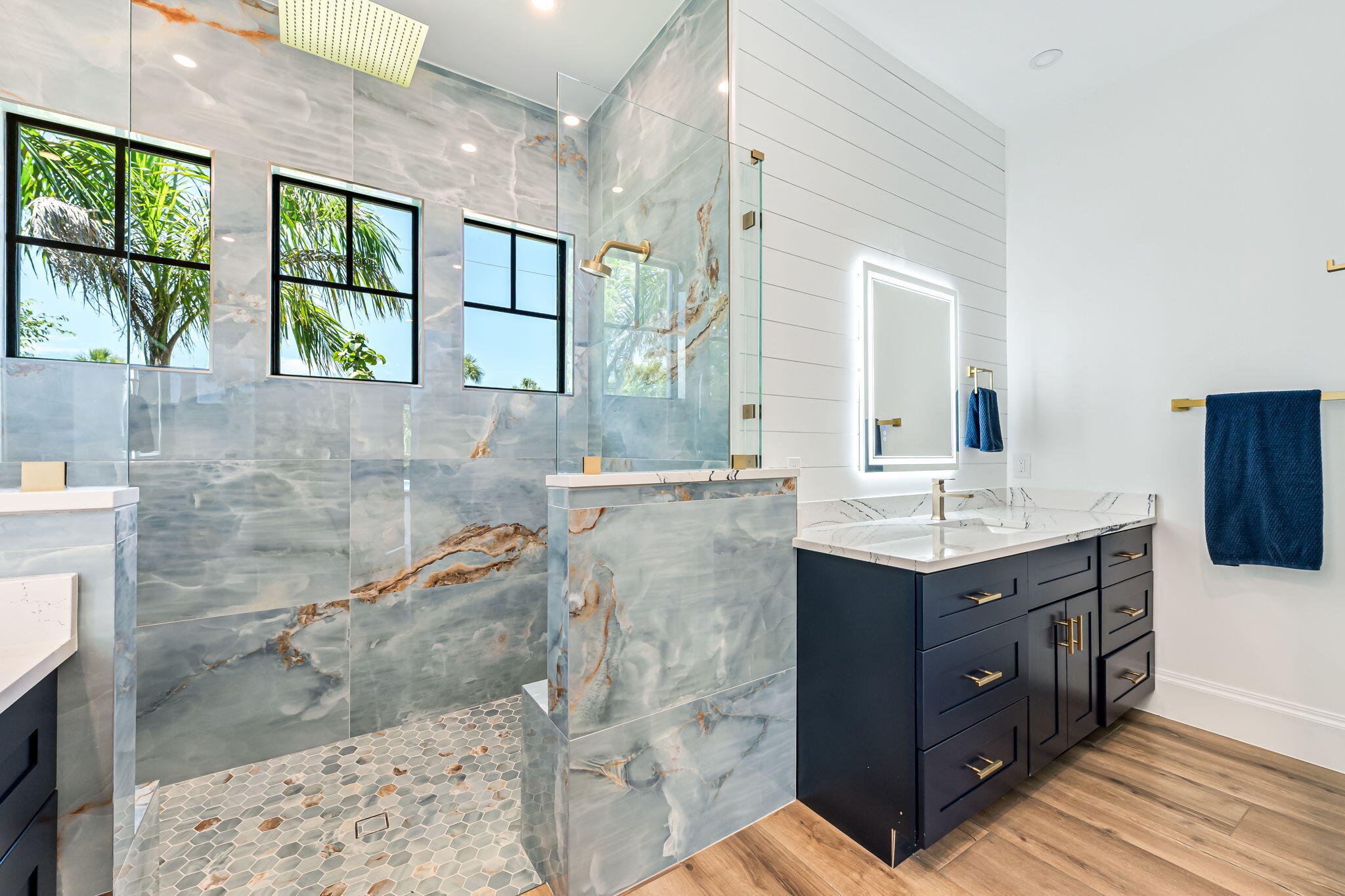 1362 San Marco Road Marco Island, FL 34145 - Photo 23 of 45 a bathroom with a granite countertop sink a large mirror and a bathtub