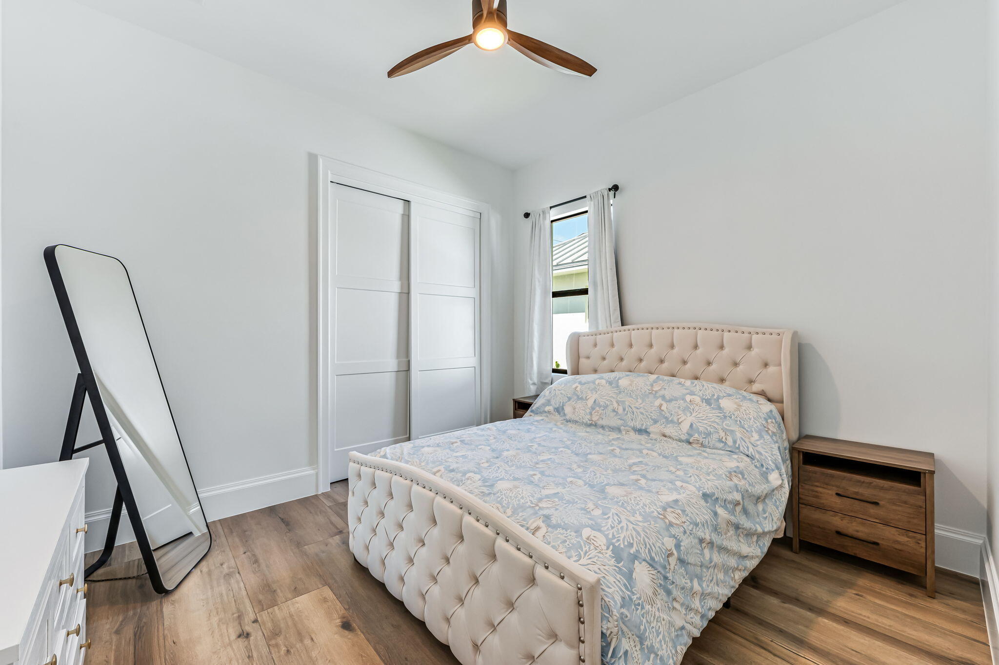 1362 San Marco Road Marco Island, FL 34145 - Photo 26 of 45 a bedroom with a bed and a flat tv screen on the dresser