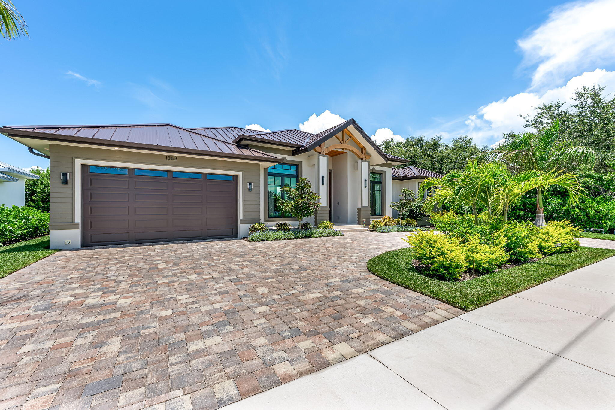 1362 San Marco Road Marco Island, FL 34145 - Photo 3 of 45 a front view of house with yard and green space