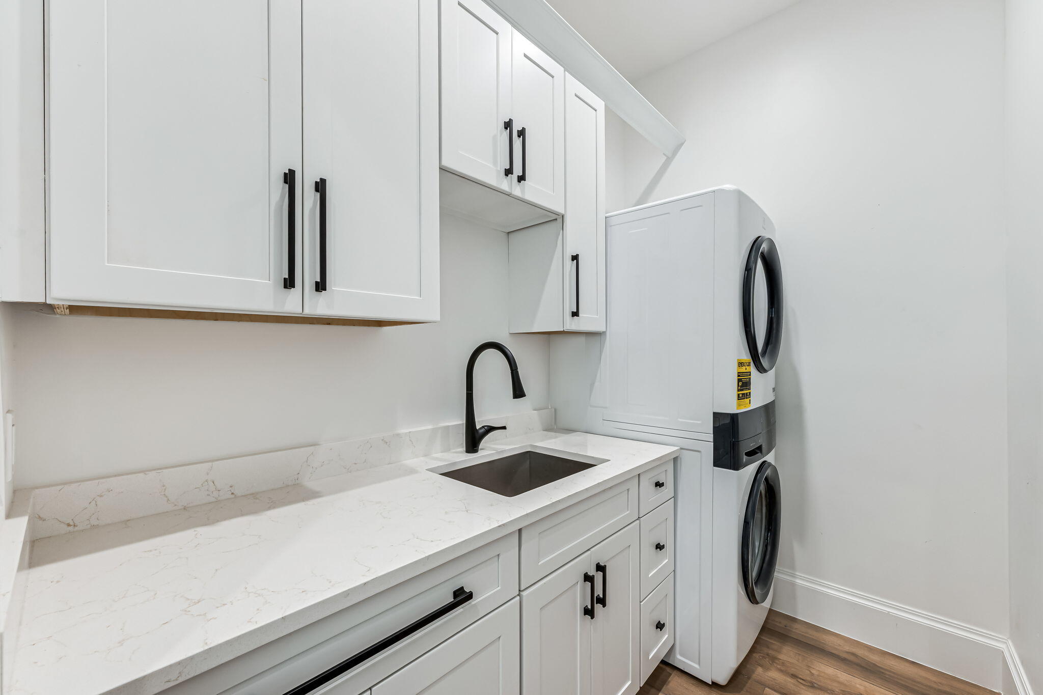 1362 San Marco Road Marco Island, FL 34145 - Photo 31 of 45 a kitchen with stainless steel appliances a sink a stove and cabinets