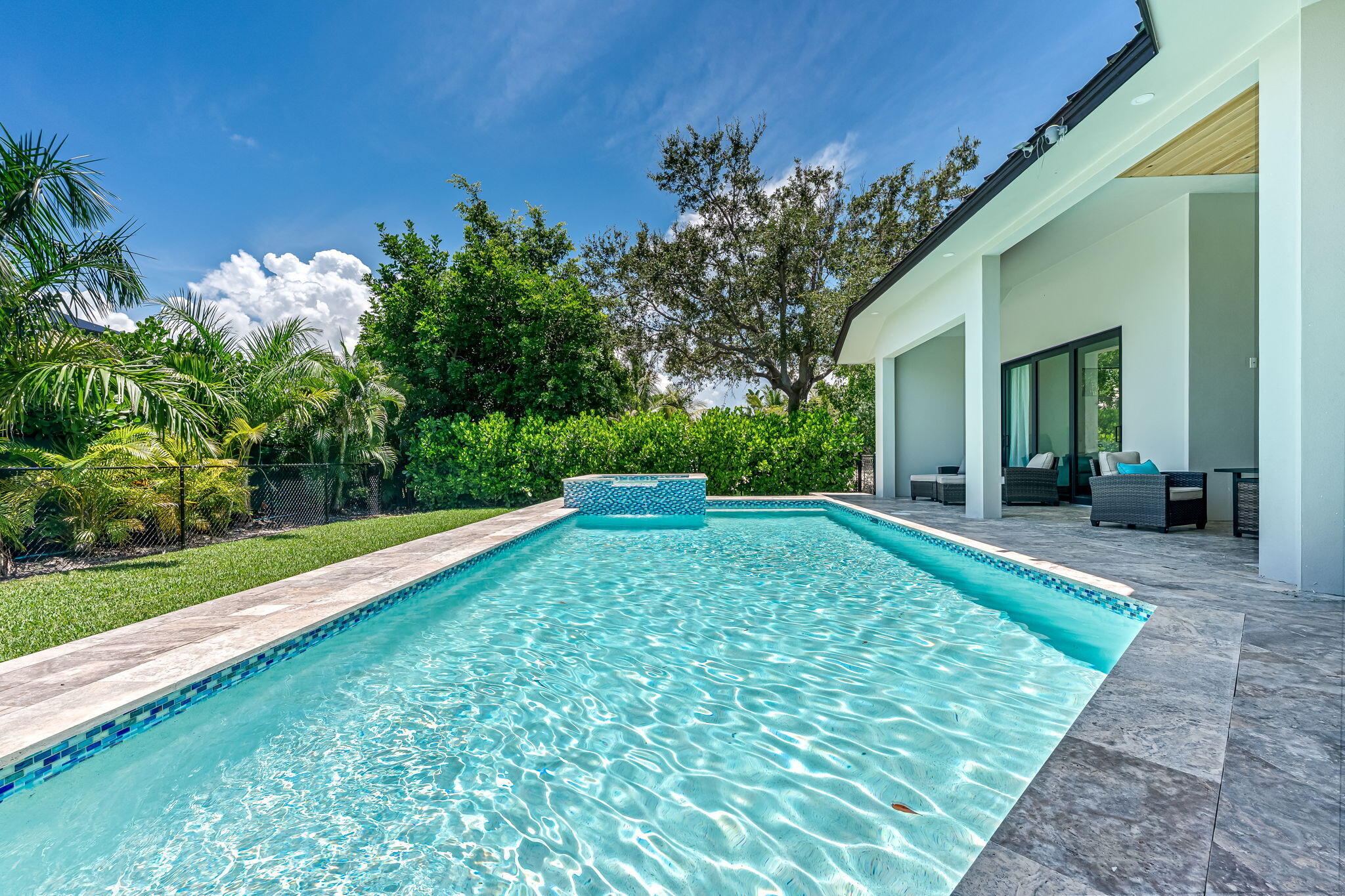 1362 San Marco Road Marco Island, FL 34145 - Photo 38 of 45 a view of a backyard with a garden