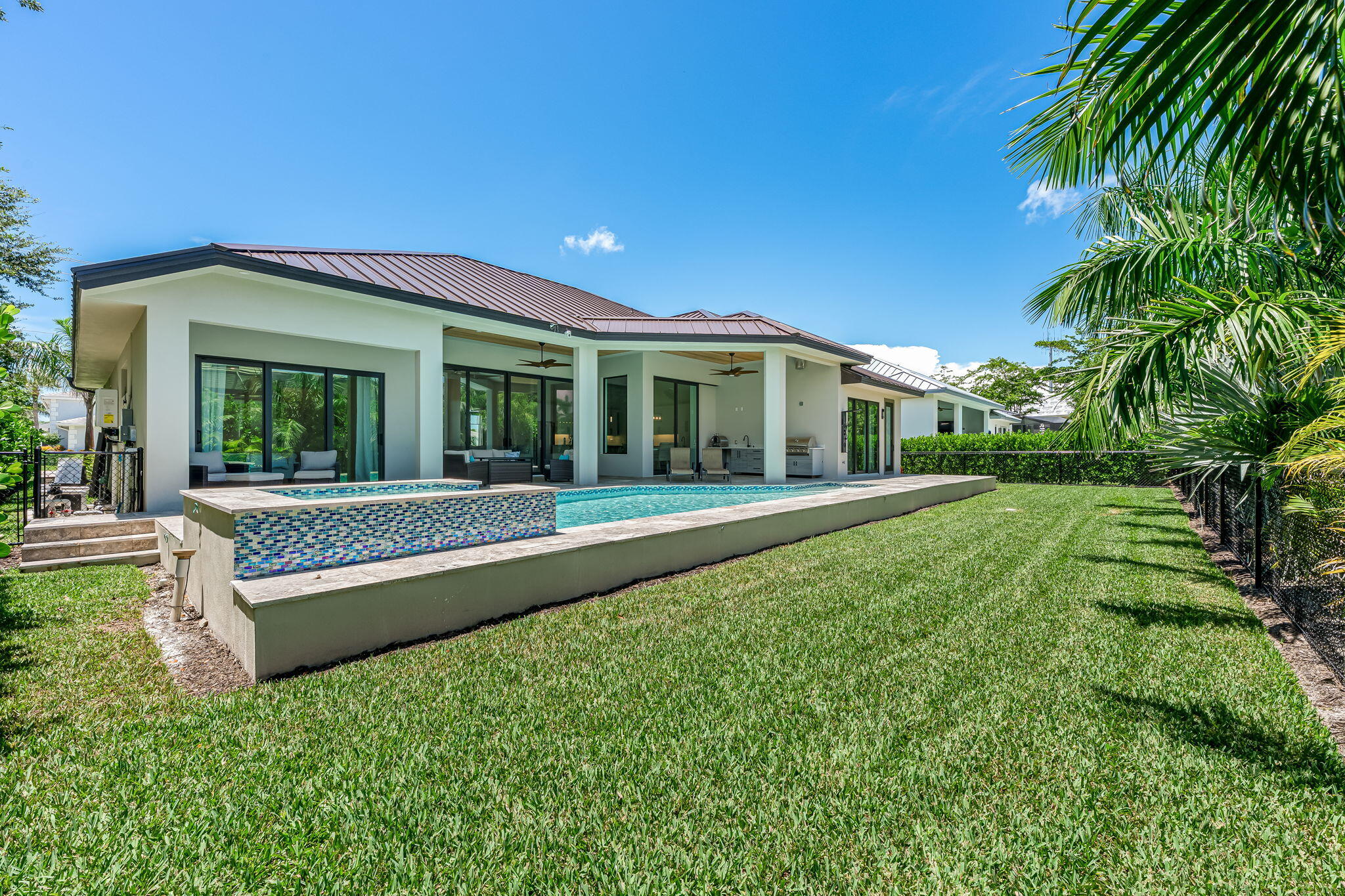 1362 San Marco Road Marco Island, FL 34145 - Photo 40 of 45 a view of house with a yard