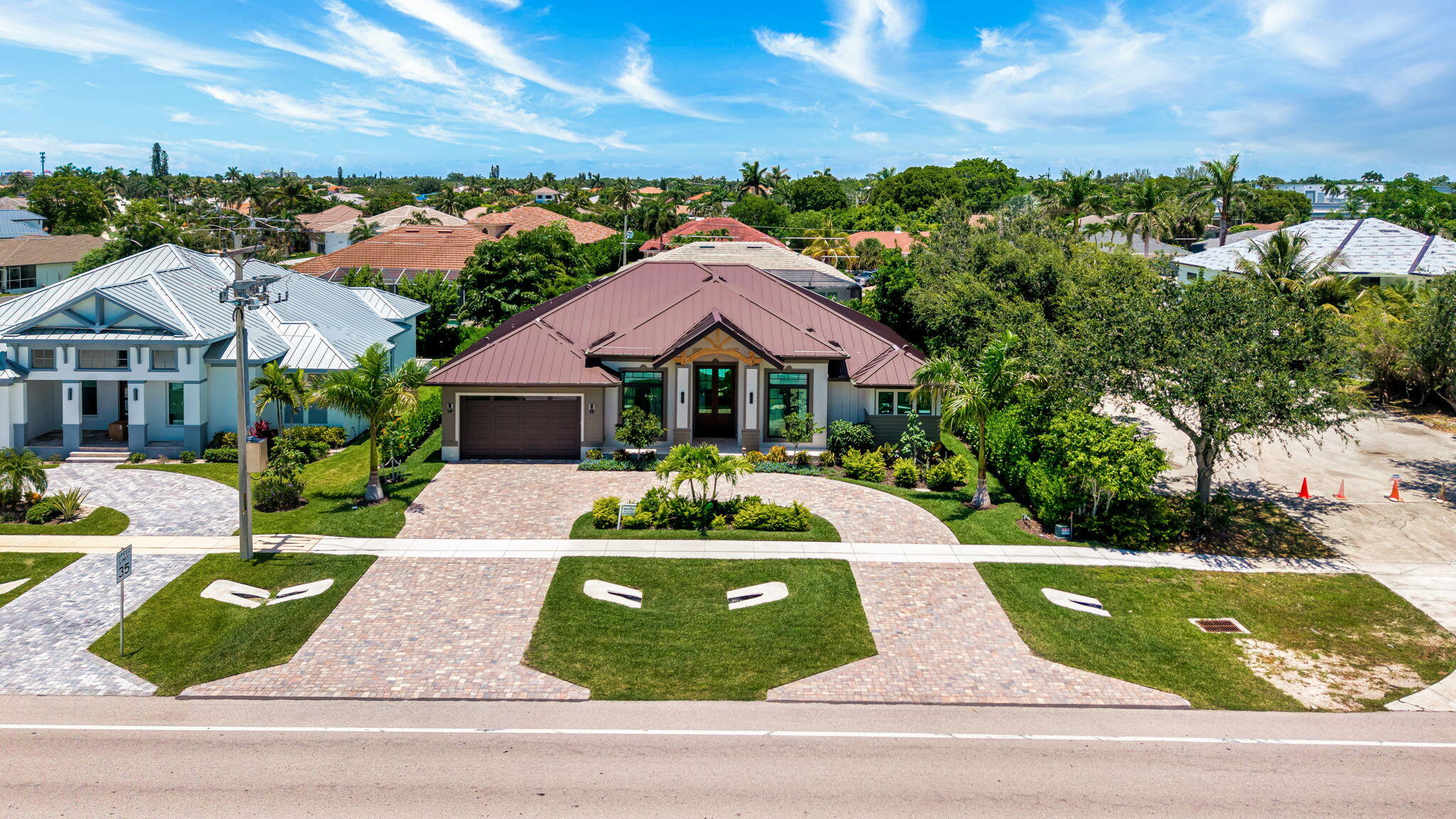 1362 San Marco Road Marco Island, FL 34145 - Photo 42 of 45 a front view of house with yard and green space