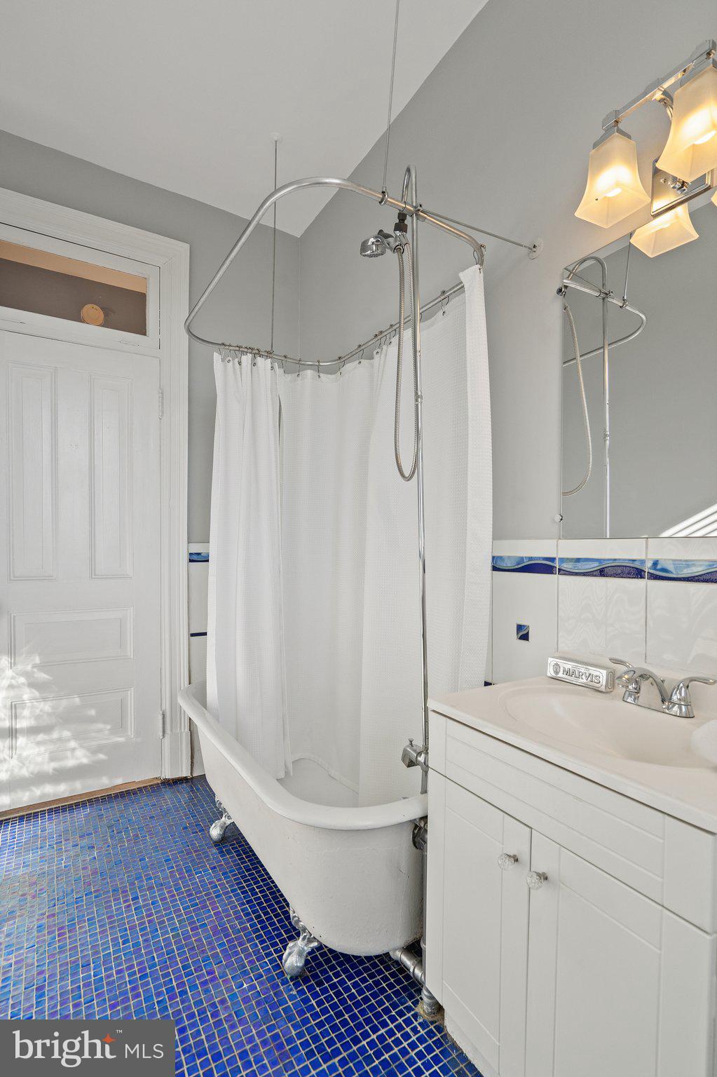 2853 Ontario Road Northwest, Unit 518 Washington, DC 20009 - Photo 17 of 23 Classic claw-foot tub and mosaic tile