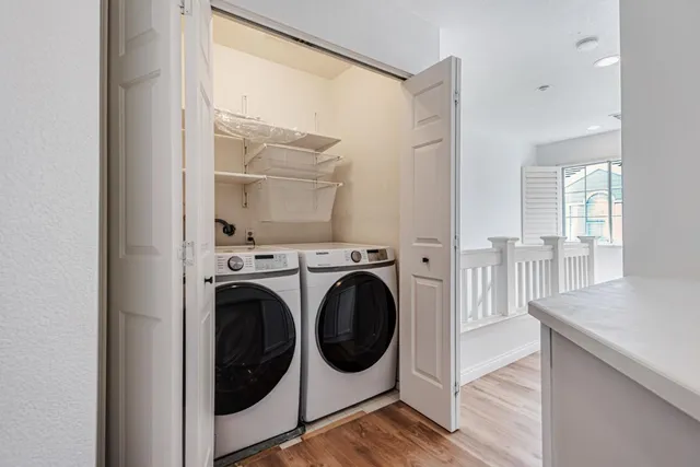 a utility room with dryer and washer