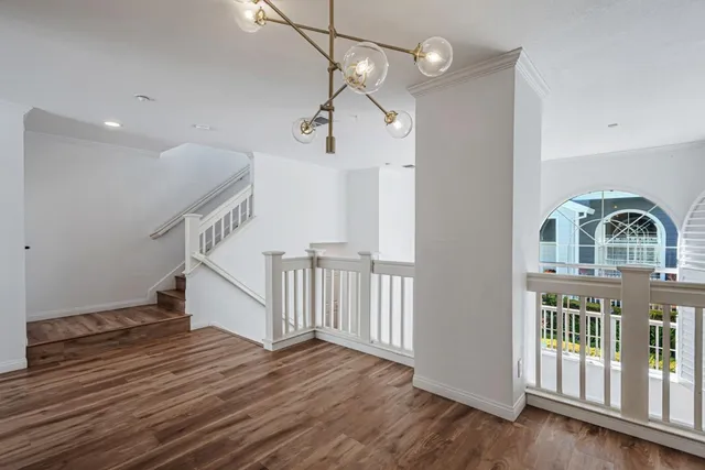 a view of entryway with wooden floor