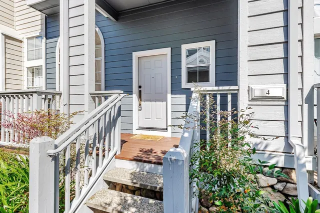 a balcony with lots of green space