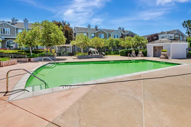 a view of a house with a swimming pool