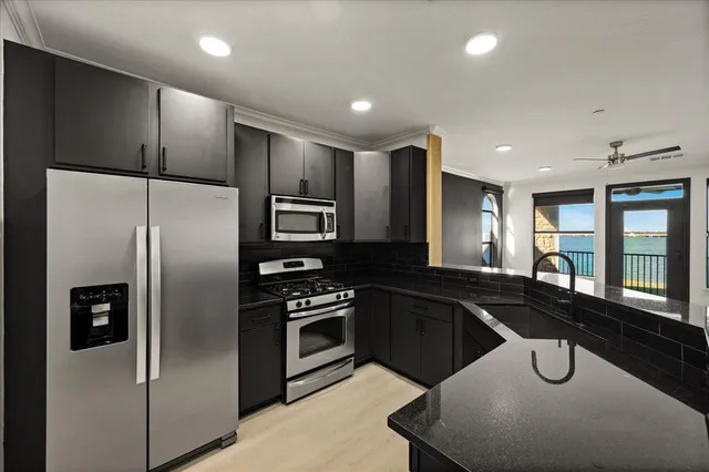 a kitchen with a sink and a window