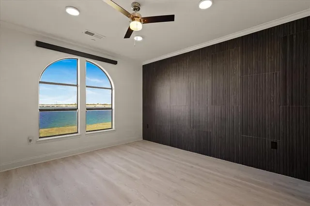 a bedroom with a bed and a cabinet