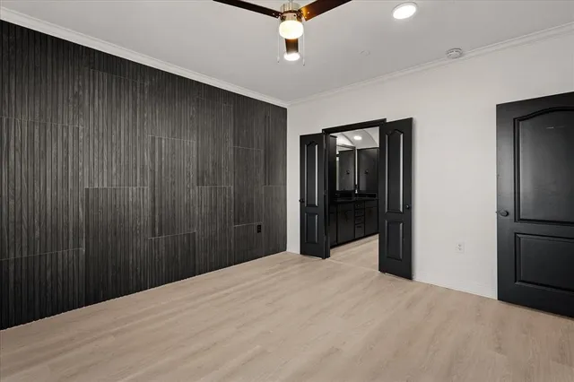 a bathroom with double sink and a mirror