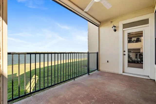 a view of a large building from a balcony
