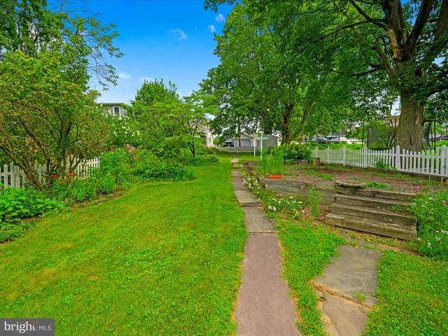 a view of a backyard with a garden