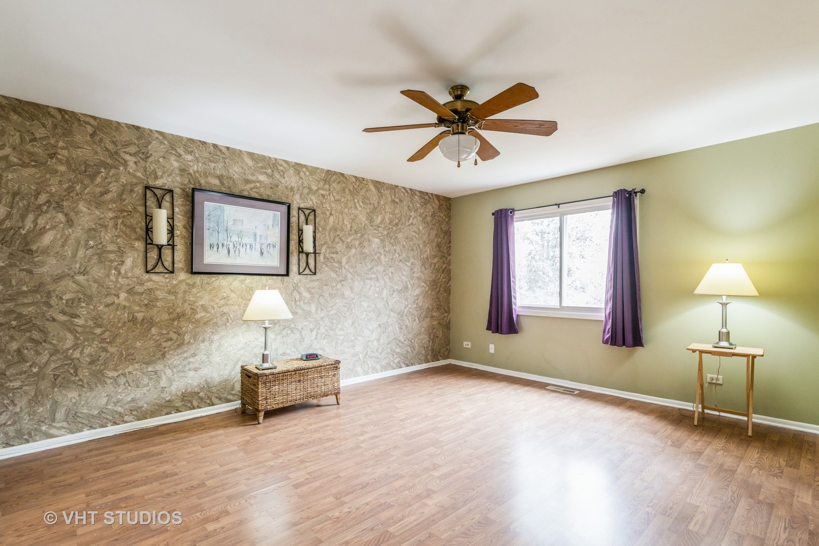 873 Barlina Road Crystal Lake, IL 60014 - Photo 14 of 24 a view of a livingroom with a hardwood floor and a ceiling fan
