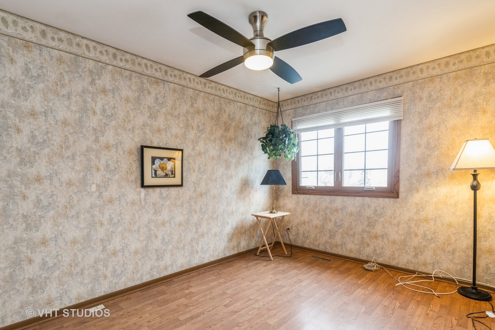 873 Barlina Road Crystal Lake, IL 60014 - Photo 16 of 24 a view of an empty room with a window and a ceiling fan