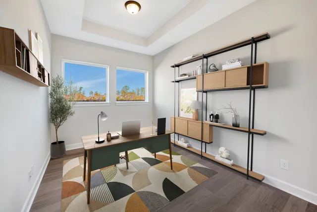 a dining room with furniture