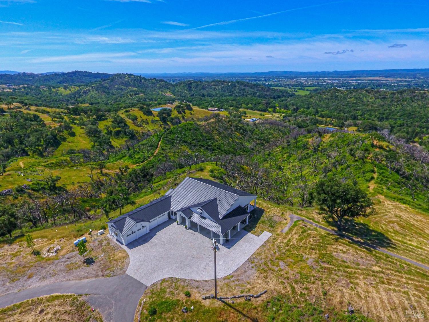 9110 Chalk Hill Road Healdsburg, CA 95448 - Photo 44 of 59 The Mayacamas, Mt. St. Helena, surrounding valleys with many vineyards and wineries, forested slopes and the azure skies are all part of the vista.