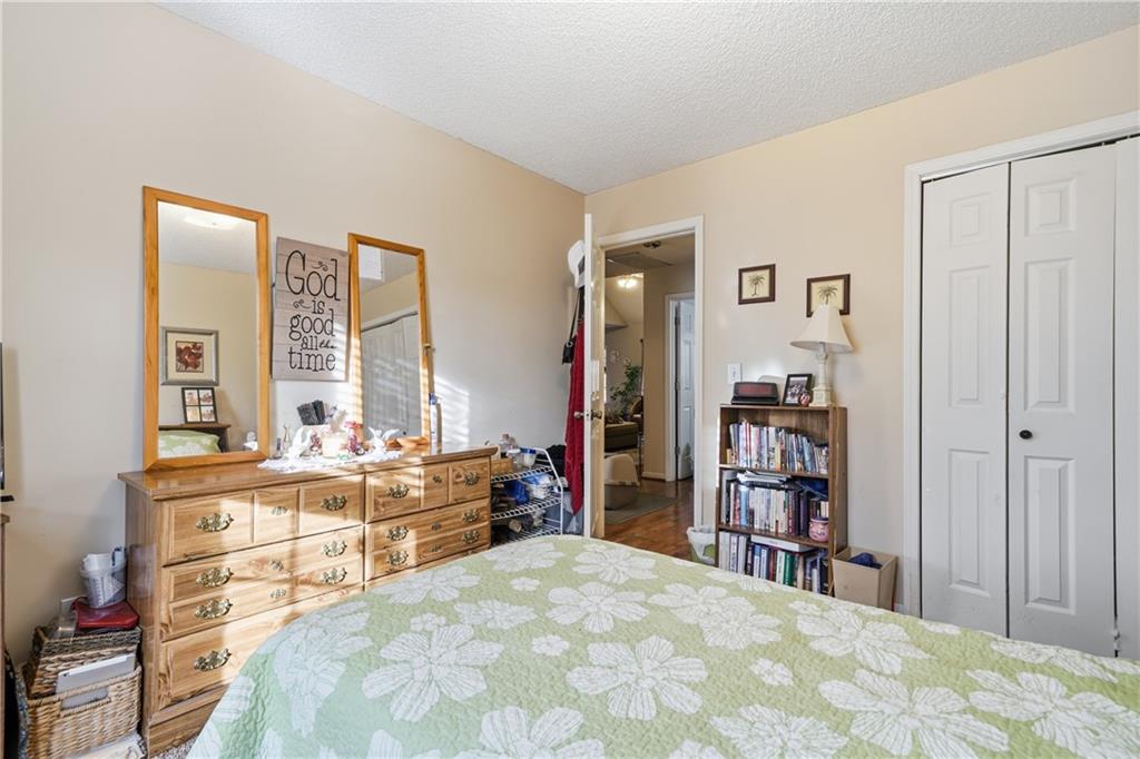 291 Buck Boulevard Southeast Calhoun, GA 30701 - Photo 12 of 32 a room with a bed and a cabinets