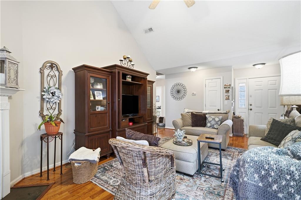 291 Buck Boulevard Southeast Calhoun, GA 30701 - Photo 18 of 32 a living room with furniture and a flat screen tv
