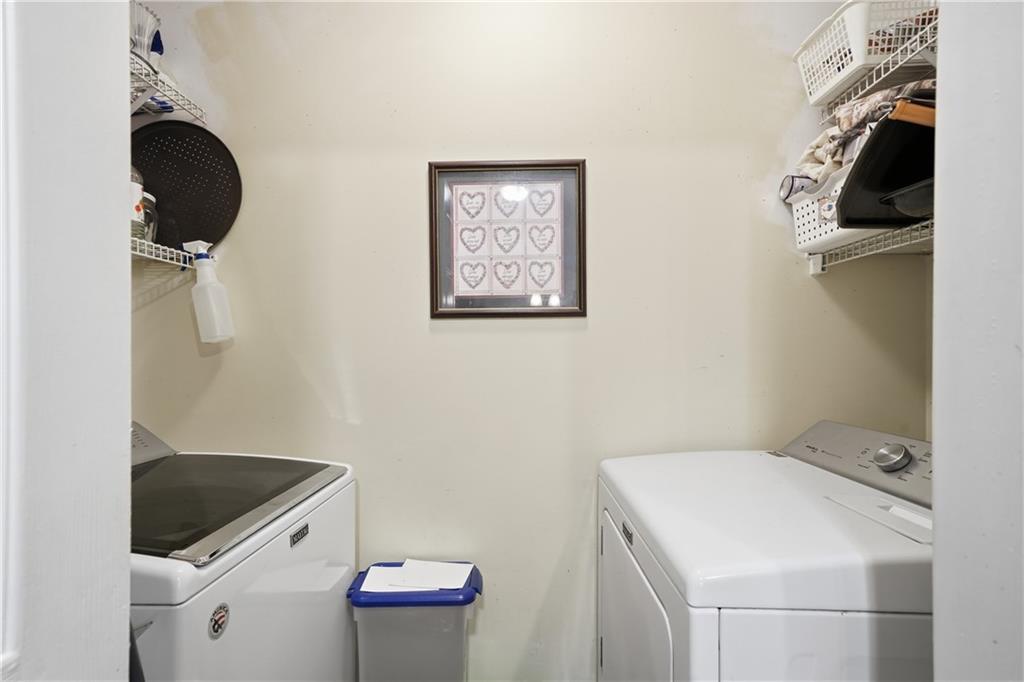 291 Buck Boulevard Southeast Calhoun, GA 30701 - Photo 25 of 32 a utility room with dryer and washer