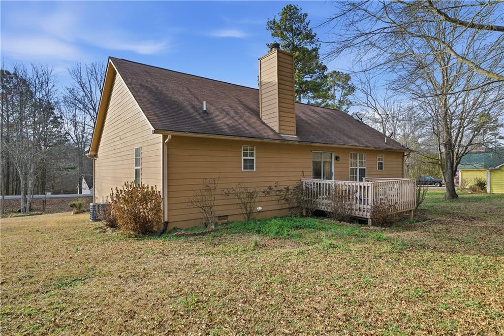 291 Buck Boulevard Southeast Calhoun, GA 30701 - Photo 29 of 32 a view of a house with a yard