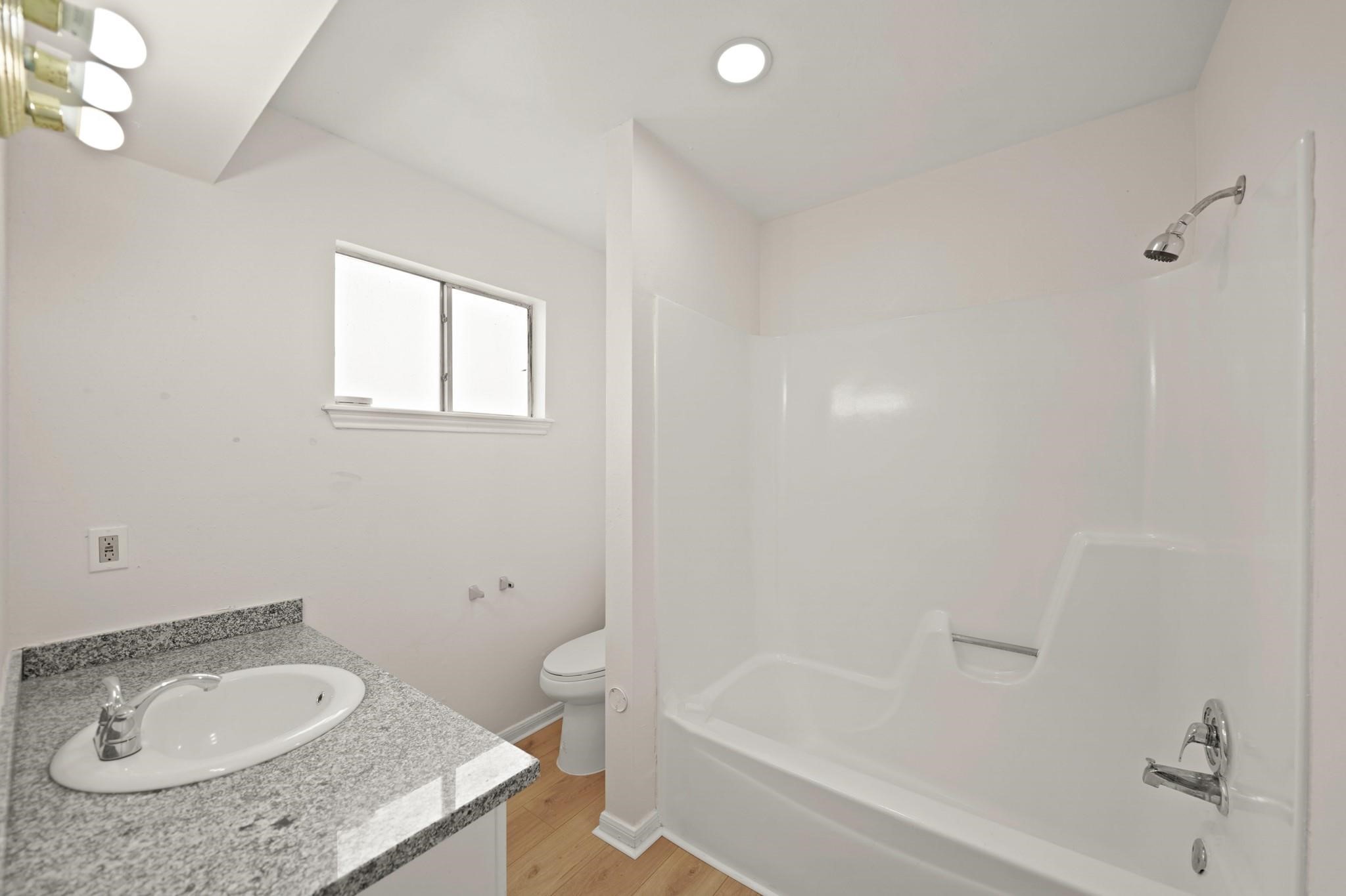 5 Dallas Court, Unit 1 Angleton, TX 77515 - Photo 10 of 18 Bathroom 1