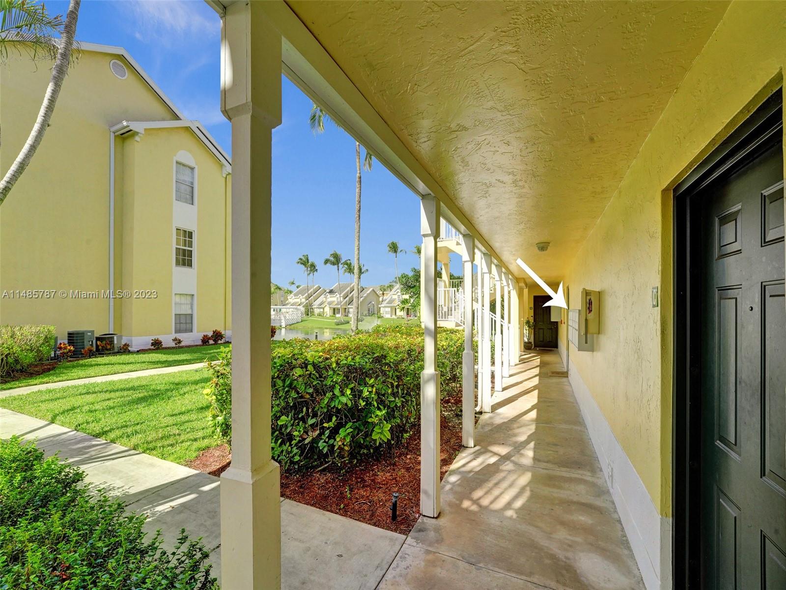 6339 La Costa Drive, Unit C Boca Raton, FL 33433 - Photo 22 of 23 a view of a back yard of the house