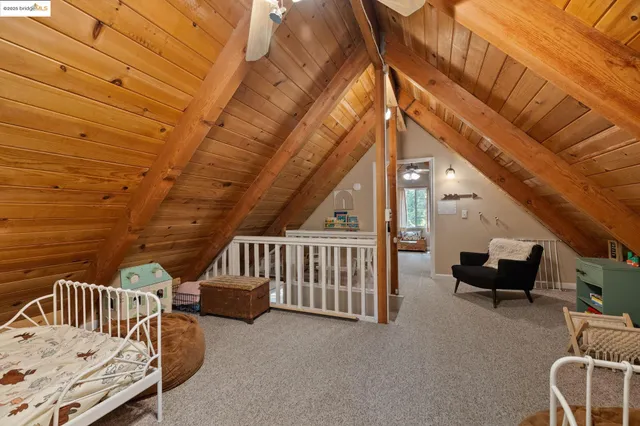 a bedroom with bed and a window