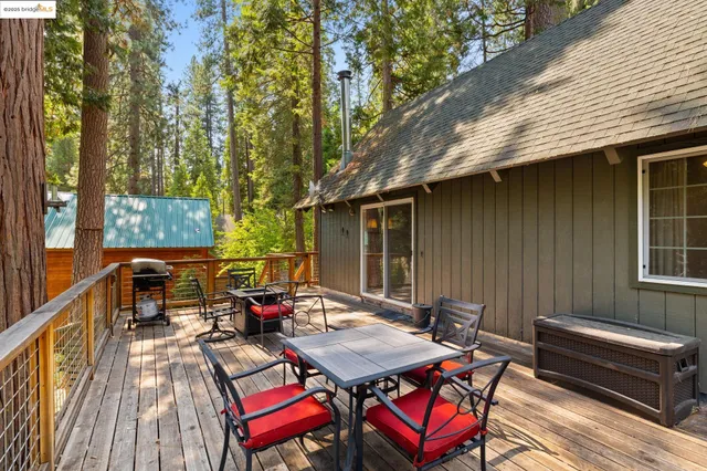 a view of a chairs and table in the outdoor space