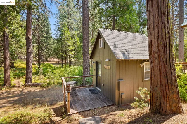 a backyard of a house with lots of green space
