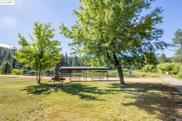 a view of lake with green space