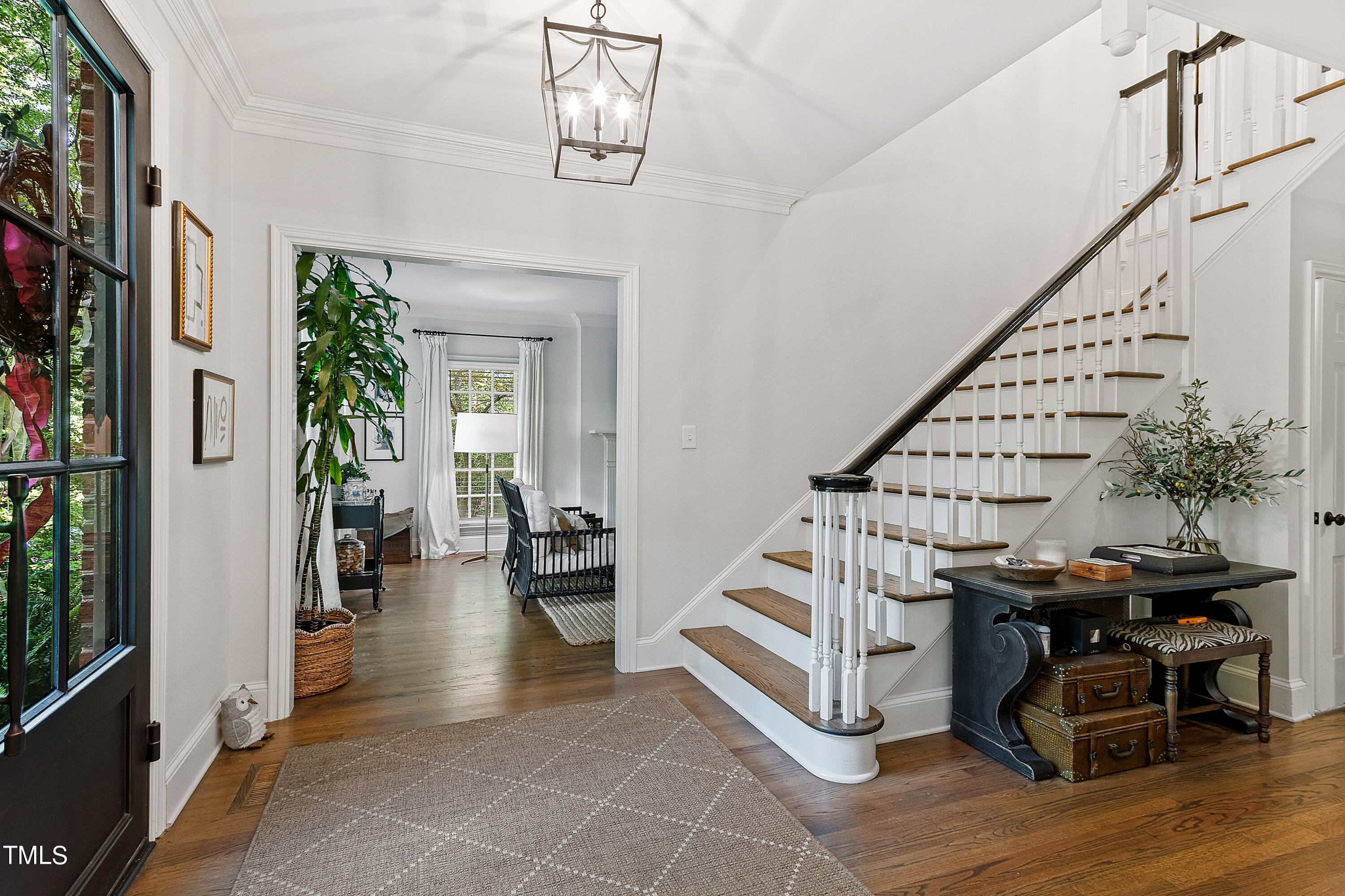 612 Marlowe Road Raleigh, NC 27609 - Photo 12 of 60 a view of entryway with livingroom and stairs