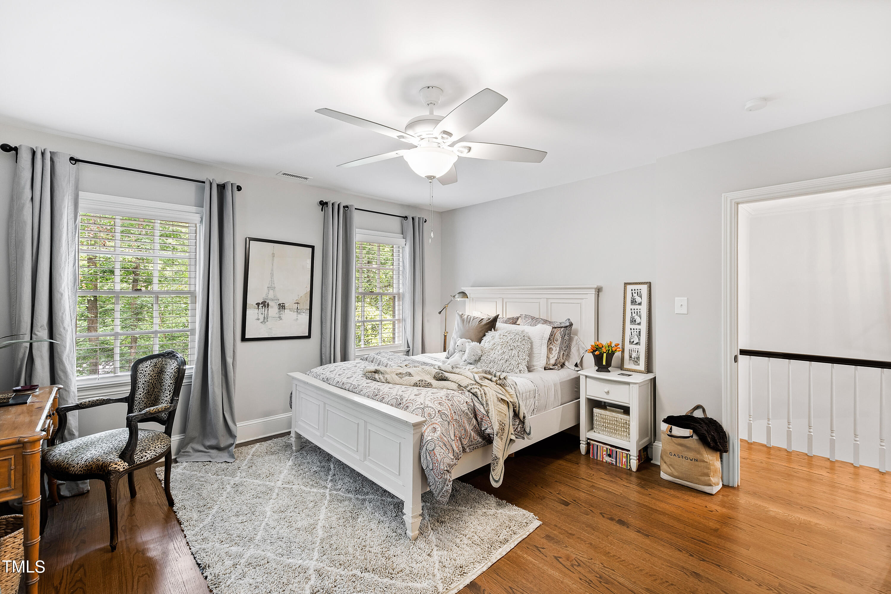 612 Marlowe Road Raleigh, NC 27609 - Photo 27 of 60 a bedroom with a bed and a large window