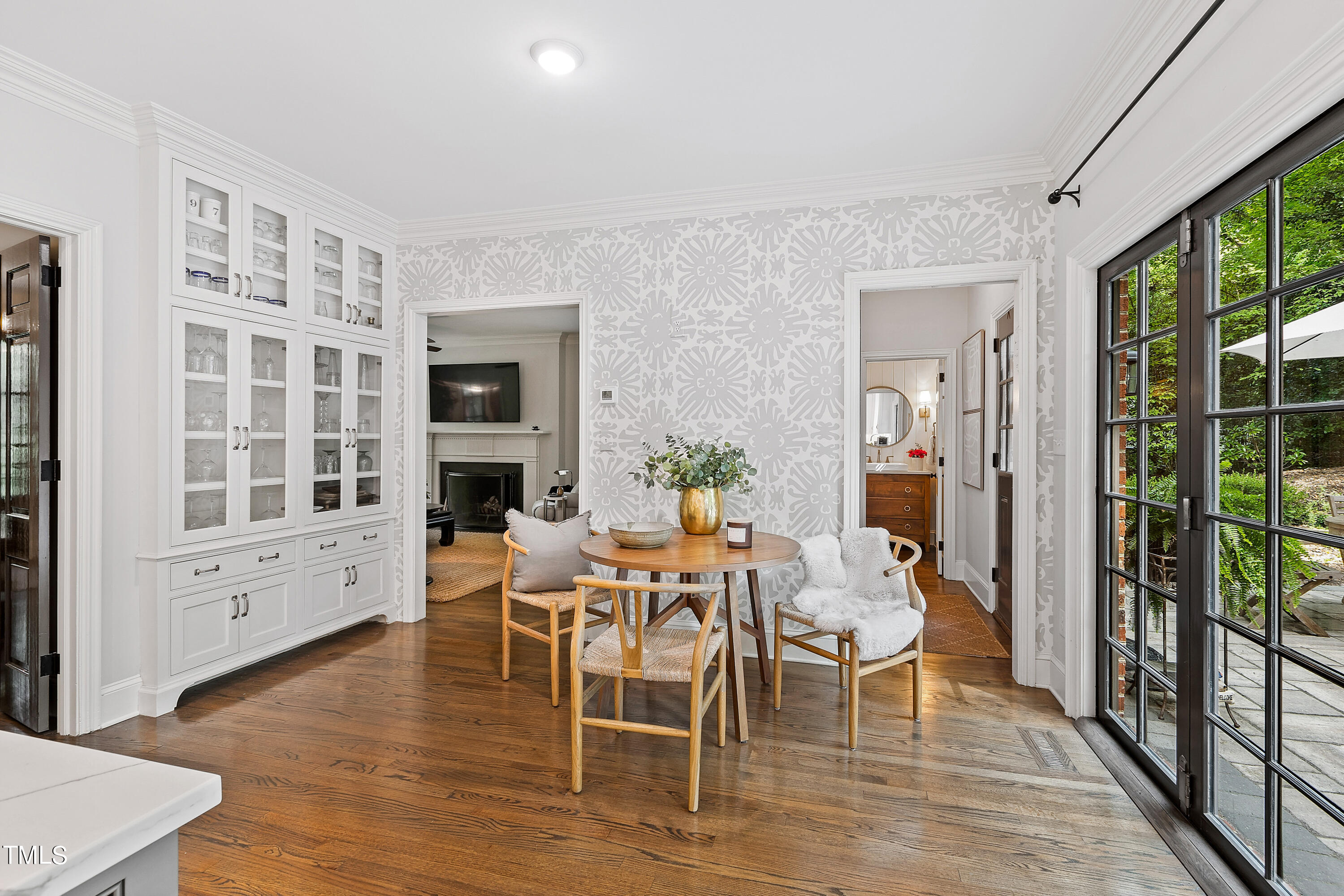 612 Marlowe Road Raleigh, NC 27609 - Photo 30 of 60 a view of a dining room with furniture window and wooden floor